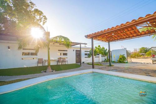 Primera Seccion House | Incredible in-town pool house with BBQ area!