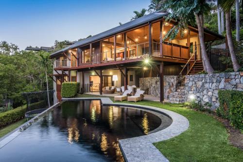 Hamilton Island House | Indulge in the Lap of Luxury, Iluka is Your Private Ocean-view Haven on Half an Acre with Infinity Pool and Two Golf Buggies