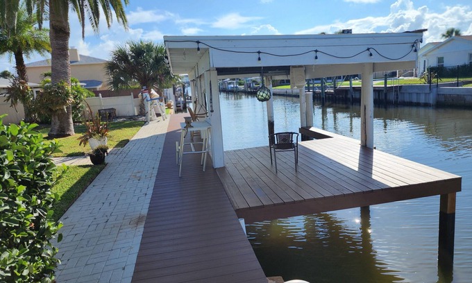 South Daytona House | Intercostal channel house with boat dock and ping-pong table