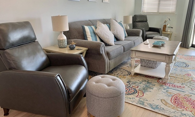 Edisto Island Condo | Inviting waterfront condo with marsh view, pool, balcony, central AC, & W/D