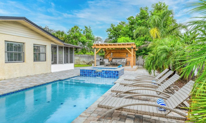 Butler Beach House | Island Time - Pool & Heated Spa, Lovely Home Near the Beach!