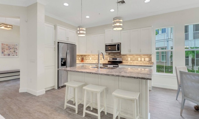 Isles of Collier Preserve Apartment | Isles of Collier | 3 bedrooms | 3 bathrooms | a den/office | sunroom | 2-car garage.