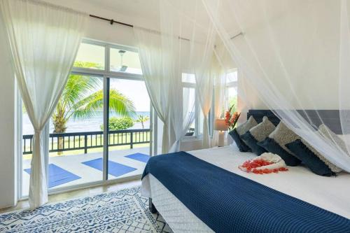 New Hope Villa | Ivy's Cove Beach Side Condo - Luxury Villa