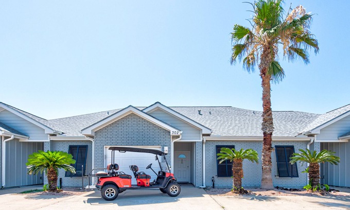 Safe Harbor Condo | Just a few blocks from the beach with a community pool. Sleeps 8!