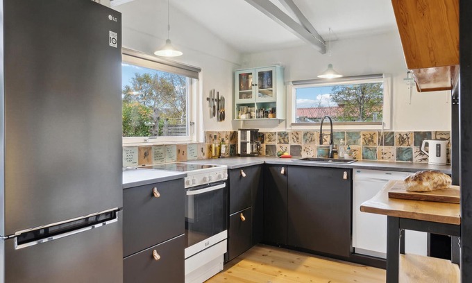 Store Fuglede House | Just a short walk from the sandy beach, this practical vacation home welcomes you.
