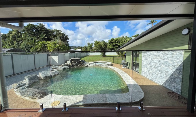 Daintree House | Just seconds from tours and dining, with a relaxing pool and spa to unwind
