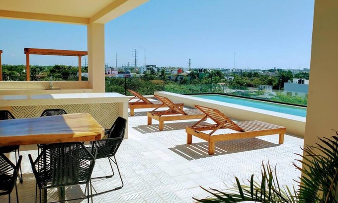 Ejidal Apartment | Kaab Atp new vacation Apt with rooftop pool, cozy!