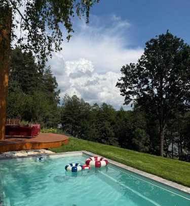 Dabrowno House | Kalbornia LAKE & POOL HOUSE by JWPM