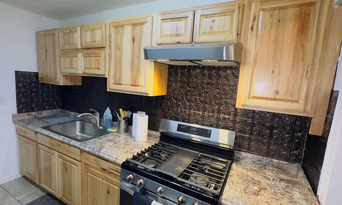 Sayles Blvd. Area House | Keep it simple at this peaceful and centrally-located place.