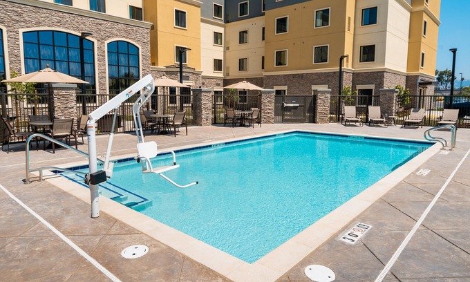 Newark Condo | King Suite. Free Breakfast. Pool. Shared BBQ. Great for Business Travelers!