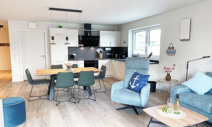 Tossens Apartment | KÜSTE33/48 - Family time. Sauna. Roof terrace.