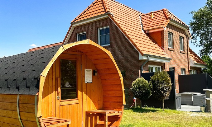 Sturenburgshof House | Lüttje Huck - Ferienwohnung 2 mit Seeblick & Sauna