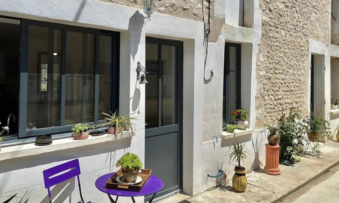 Augy House | LA FERME DE LUCIE Two-bedroom house with private garden and courtyard.