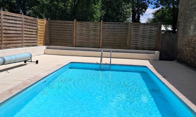 Thouarsais-Bouildroux House | LA LAUJÈRE: Discover our Gîte Ivie with its pretty garden and private swimming pool