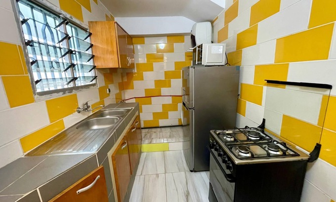 Angre Apartment | La Siesta-Abidjan- Enchanting One Bedroom Split-Mezzanine Apartment with AC-WIFI