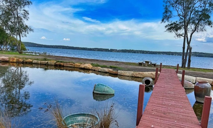Dora Creek Villa | Lake Palm Retreat