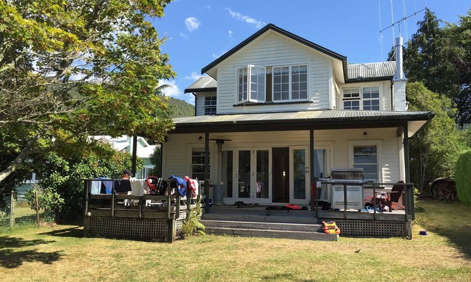 Rototai House | Lake Rotoiti LAKEFRONT home with jetty, boat ramp, parking & many extras!