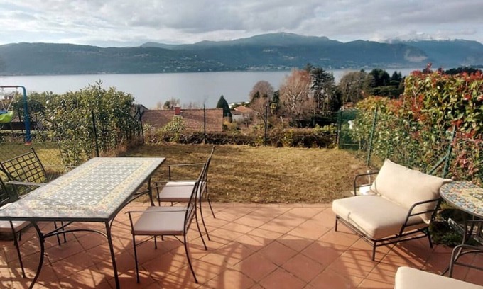 Cerro House | Lake view, pool, near the beach, pinball machine, darts, arcade