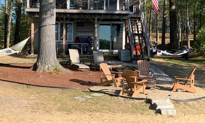 Lochmere House | Lake Winnisquam home with beach and private boat dock. 15 minutes to Gunstock.