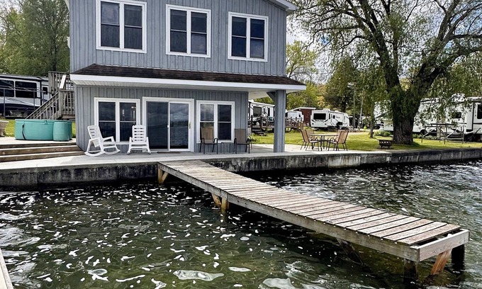 Castile House | Lakefront Cottage with Stunning Views. Boat available to rent with cottage!