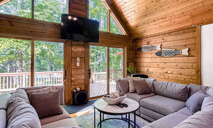 Bumpass House | Lakefront home with boat mooring, deck, hot tub, game room & fast WiFi - dogs OK
