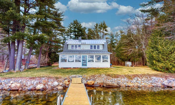 Monmouth House | Lakefront home with private dock, kayaks, firepit, grill, & sunroom