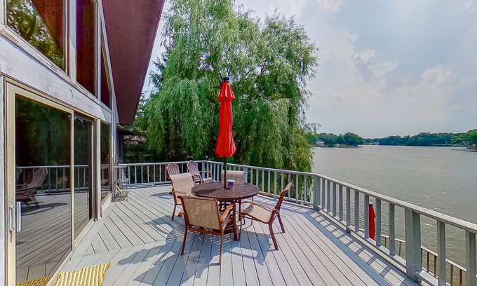 Paw Paw House | Lakefront home with spacious decks, lake views, hot tub, gas grill, & W/D