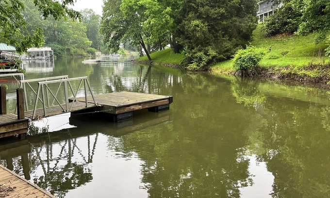 Winchester House | Lakefront home with dock. Cozy 2 bed 2 bath and screened in porch.