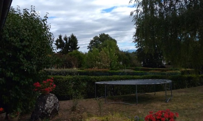 Prevessin-Moens House | Large double room, balcony, and view of large garden and the Alps