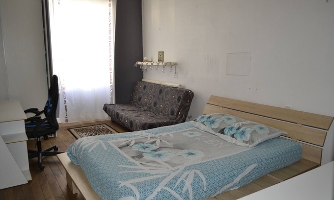 Chef-Boutonne Bed & Breakfast | Large guest room with bed and sofa bed