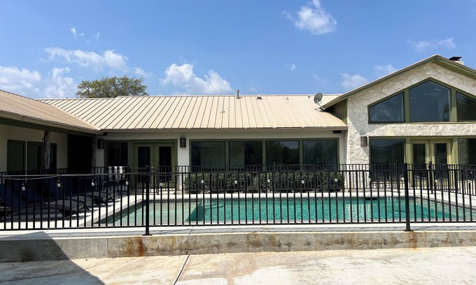 Sabinal House | Large home with a pool sitting on the tee of the first tee box