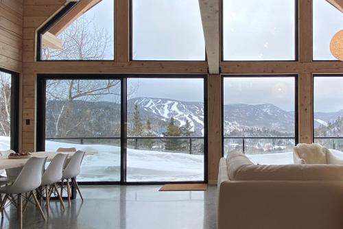 L'Anse-Saint-Jean Ski Chalet | Le Harfång - Vue imprenable - Sauna - 3min du Mont