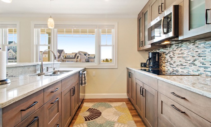 Pine Point Condo | Located directly on the white sands of Pine Point Beach.