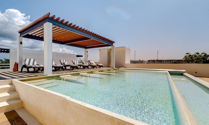 Akumal Apartment | Lock-off apartment with balcony, rooftop pool, & kitchen - near beach