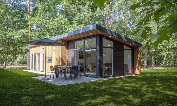 Municipality of Geldrop-Mierlo Ski Chalet | Lodge in Bospark 't Wolfsven with Garden