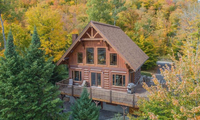 Les Pays-d'en-Haut Regional County Municipality House | Log Cabin Home with Lake and Mountain view by Reserver.ca