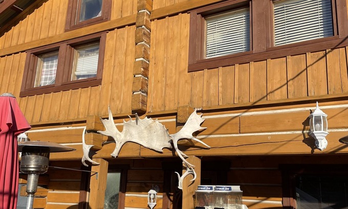 Dawson City House | Log cabin with large deck and 6 person hot tub