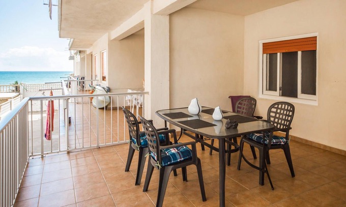 Tavernes de la Valldigna Apartment | Look forward to a wonderful sea view from the terrace of this inviting vacation apartment.