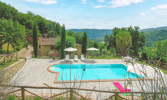 Ortignano Raggiolo House | Look forward to a fantastic view of the countryside on vacation in this appealing vacation home with