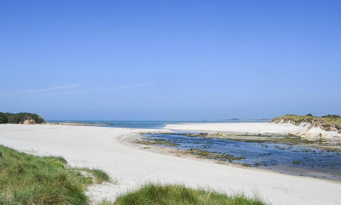 Plougoulm House | Look forward to a relaxing vacation in this vacation home not far from the sea.