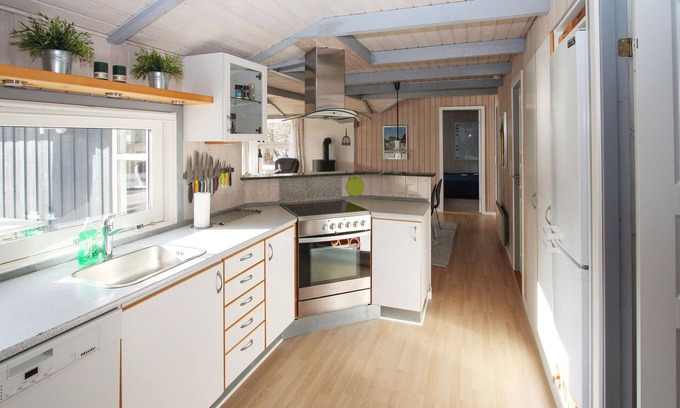 Marup House | Look forward to a vacation with your own sauna in this vacation home near the sea!