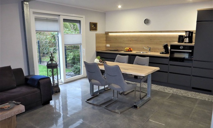 Berumbur House | Look forward to relaxing on approx. 54 square meters of living space in the Berumbur vacation park near the North Sea coast. Our facilities: fenced property (ideal for dog owners), parking space, garage for bicycles/e-bikes, underfloor heating.