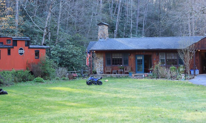 Rye Valley House | Lovely cottage by stream with caboose and covered bridge over trout stream