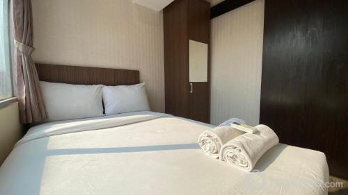 Cipaganti Apartment | Lower Floor and Simply Modern 2BR Apartment at The Jarrdin Cihampelas By Travelio