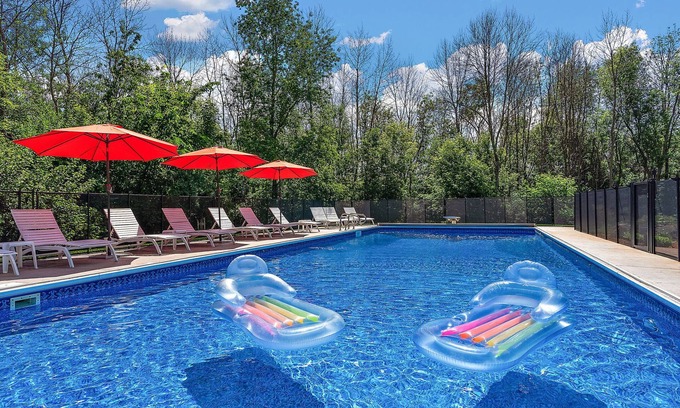 Lakeville House | Lux Retreat on 5 Wooded Acres-Pool/Hot Tub/Tiki Bar/Game Room- Great for Groups!