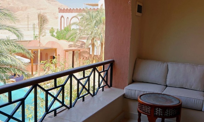 Luxor House | Luxe Middle Floor Suite at Malkata House: Pool & Views