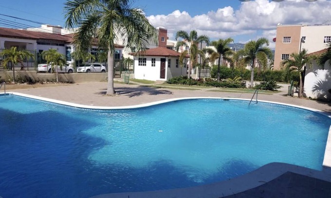 Gregorio Luperon Apartment | Luxury condo with pool gym parking wifi and more
