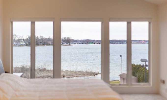 La Porte House | Luxurious Lakefront Estate with Pool, King Beds, Hot Tub MTM Premier Property Management