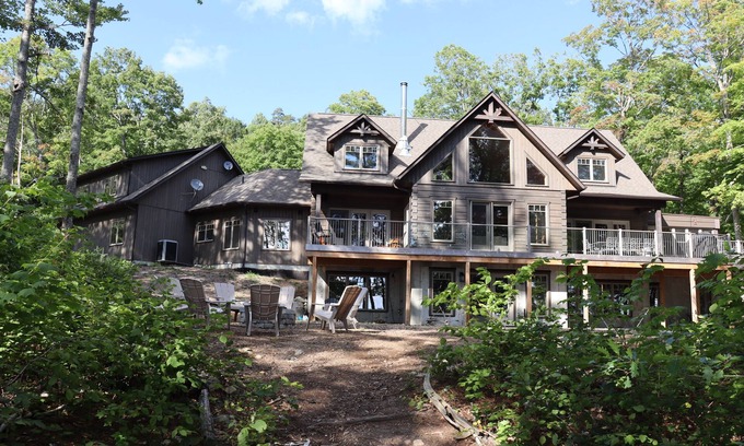 Dysart et al House | Luxurious log cottage with 600-feet of waterfront, 90 Acres.