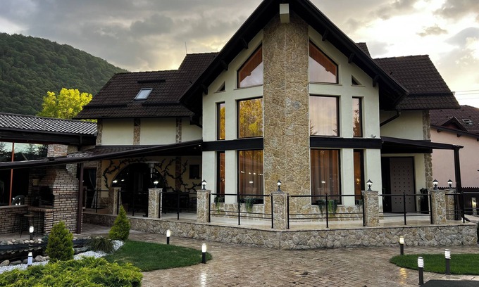 Bran Ski Chalet | Luxurious Villa Near Dracula's Castle with Indoor Pool, Theater, and More